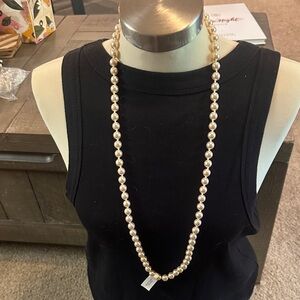 30”knotted strand faux pearls . No clasp. NWT